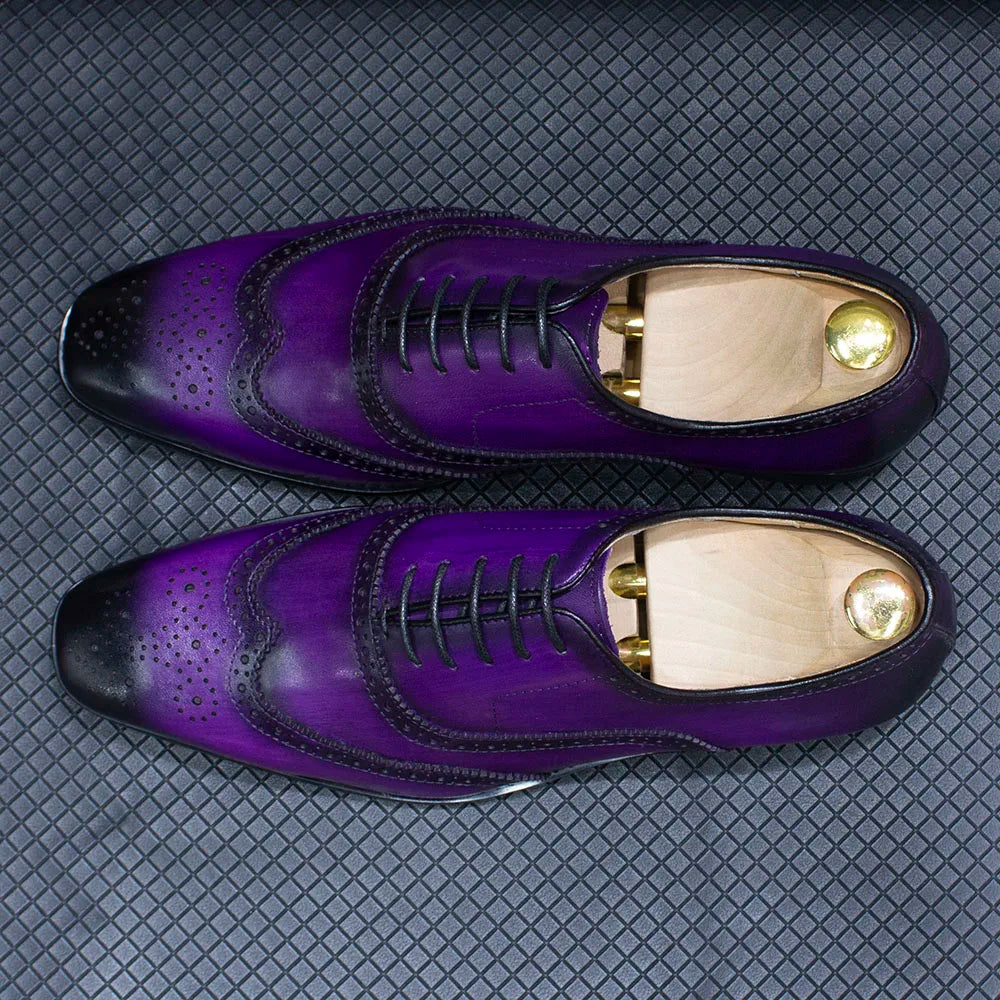 Zapatos Oxford de hombre en cuero con detalles wingtip