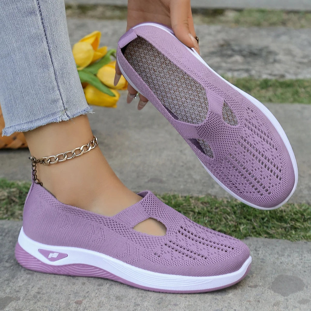Zapatillas de tejido calado con cuña baja y punta redonda