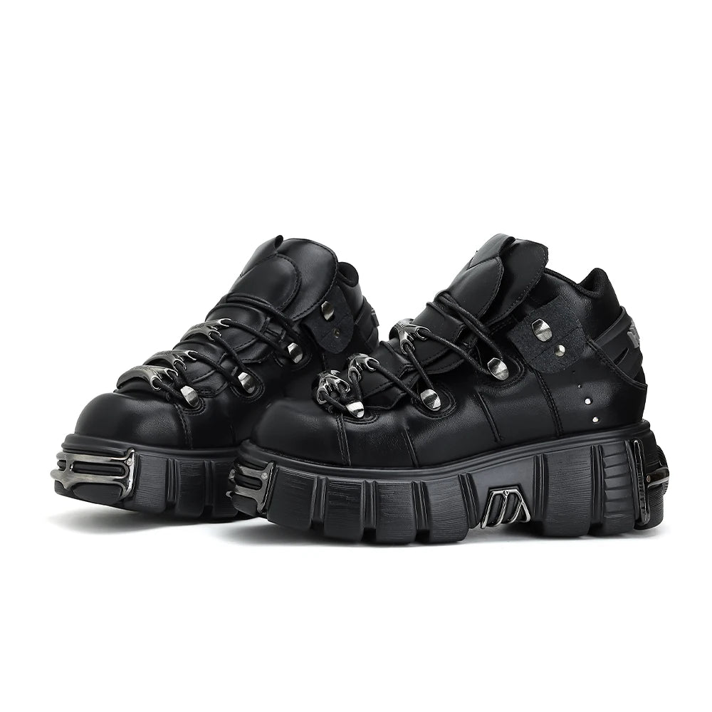 Borcegos de plataforma con cordones y detalles metálicos
