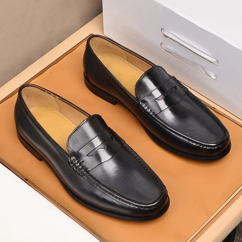 Mocasines penny de cuero con forro de gamuza