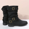 Botas cortas con hebilla decorativa y taco cuña bajo