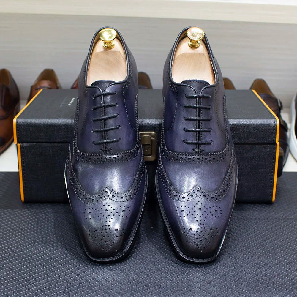 Zapatos Oxford de hombre en cuero con detalles wingtip