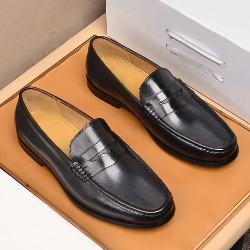 Mocasines penny de cuero con forro de gamuza