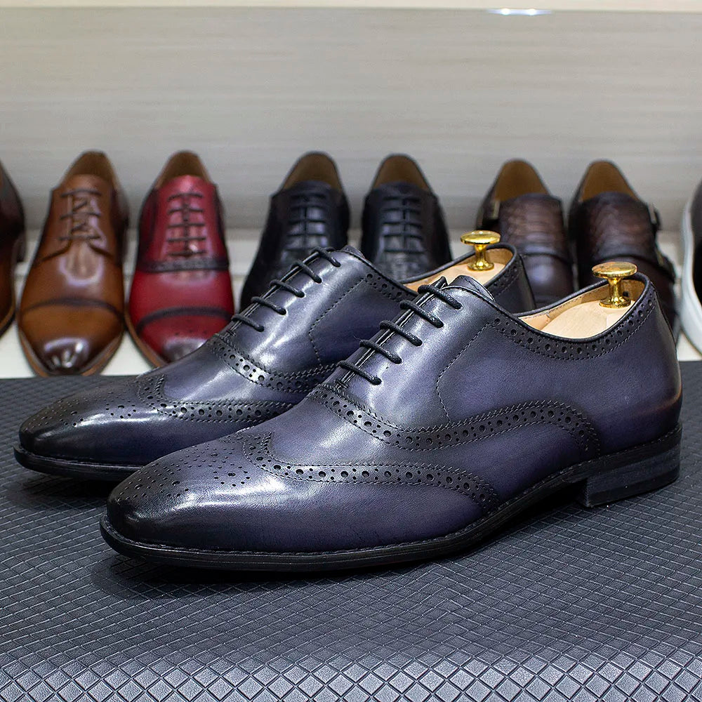 Zapatos Oxford de hombre en cuero con detalles wingtip