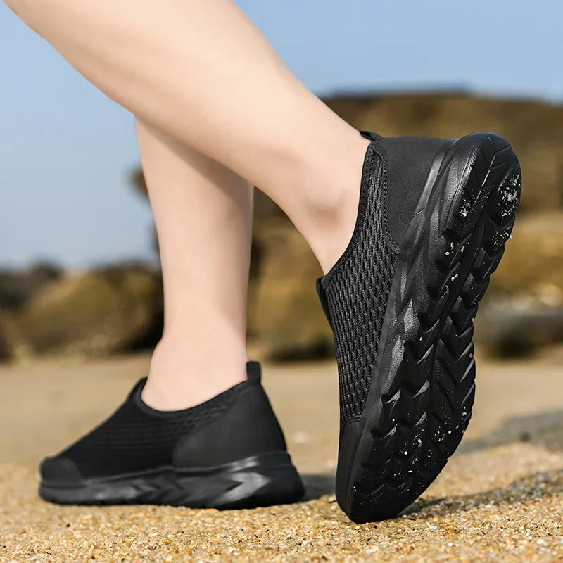 Zapatillas unisex de tela con construcción cosida