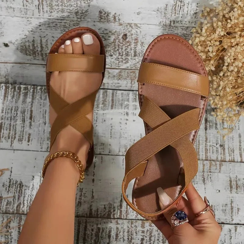 Sandalias planas de tejido con punta abierta