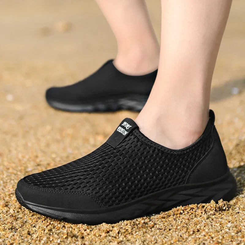 Zapatillas unisex de tela con construcción cosida