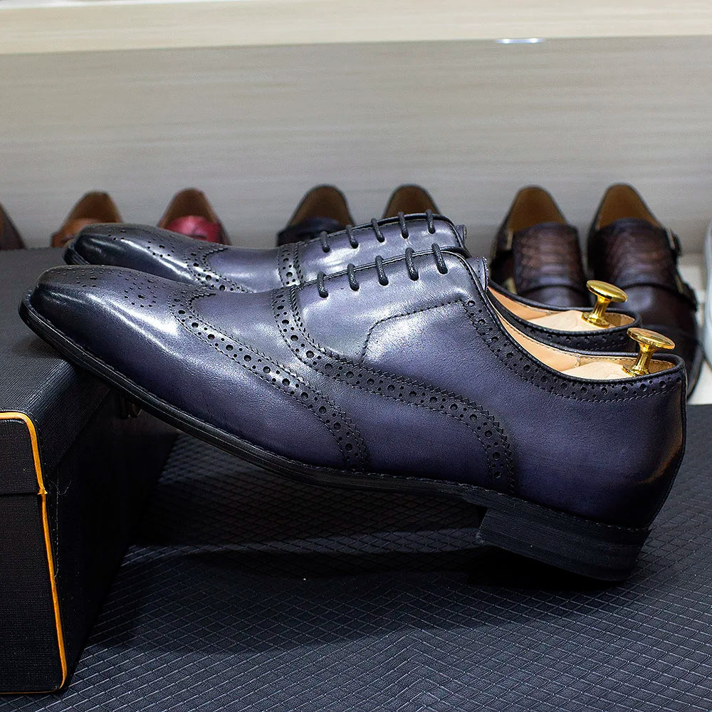 Zapatos Oxford de hombre en cuero con detalles wingtip