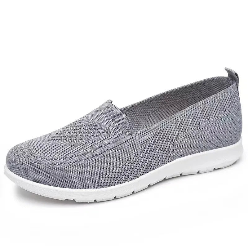 Zapatillas de mujer de malla con construcción cosida