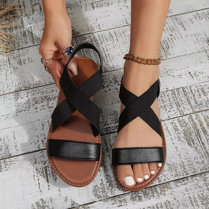Sandalias planas de tejido con punta abierta