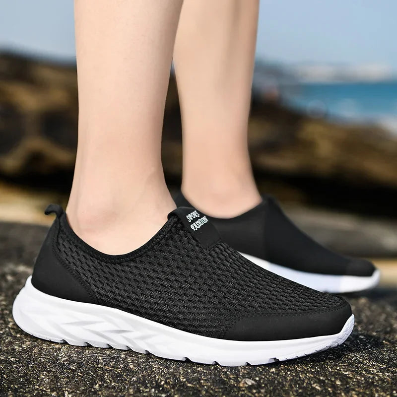 Zapatillas unisex de tela con construcción cosida