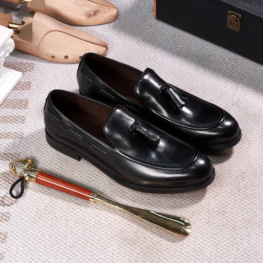 Mocasines de cuero con borlas y punta afinada