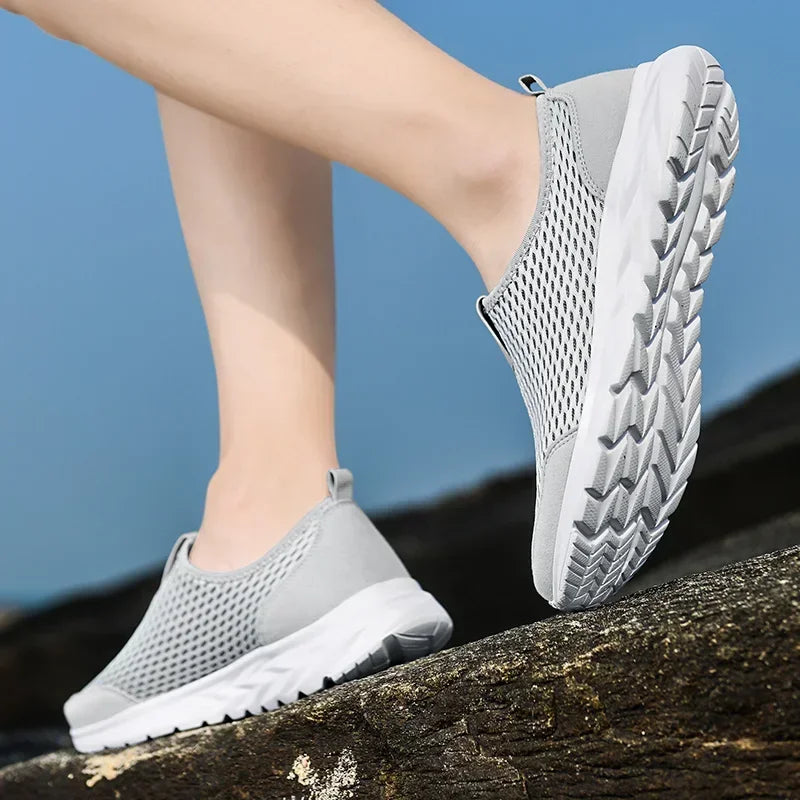 Zapatillas unisex de tela con construcción cosida