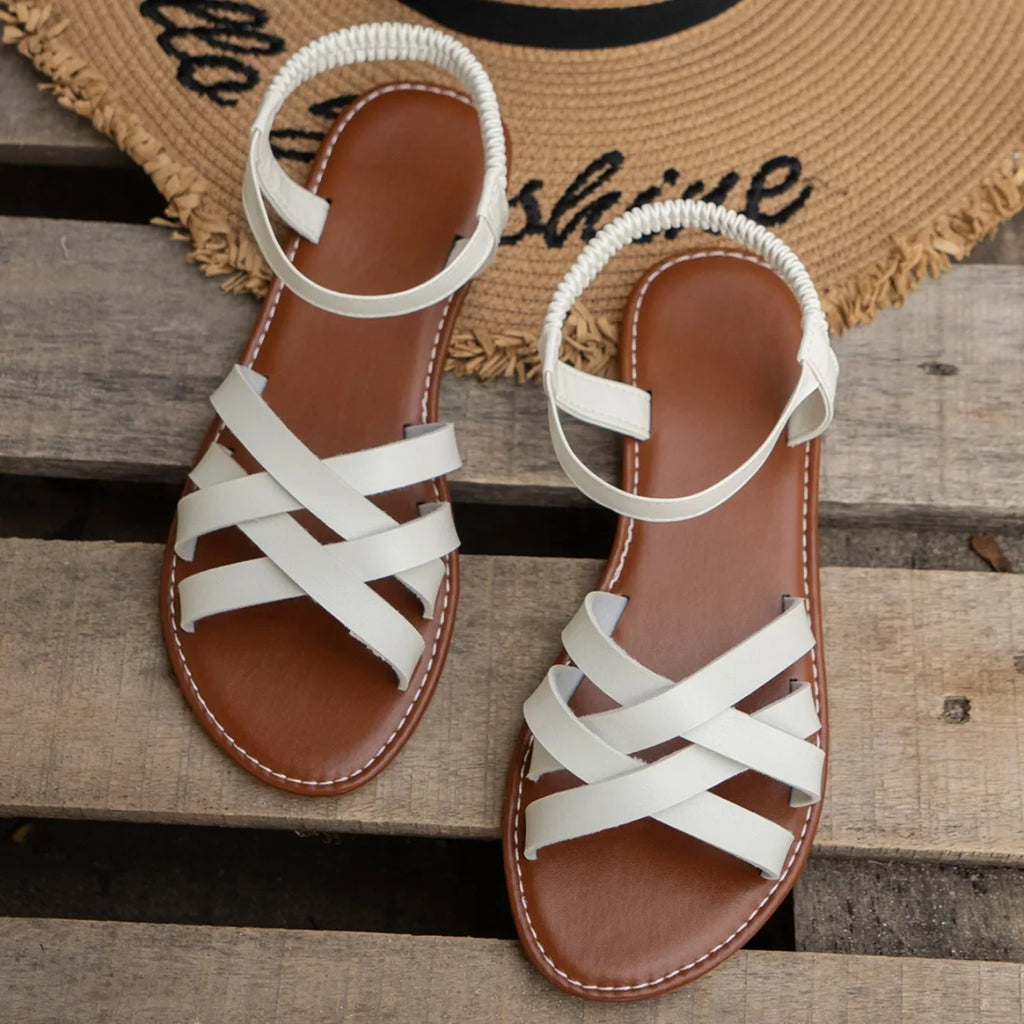 Sandalias de estilo romano con tira posterior y taco bajo