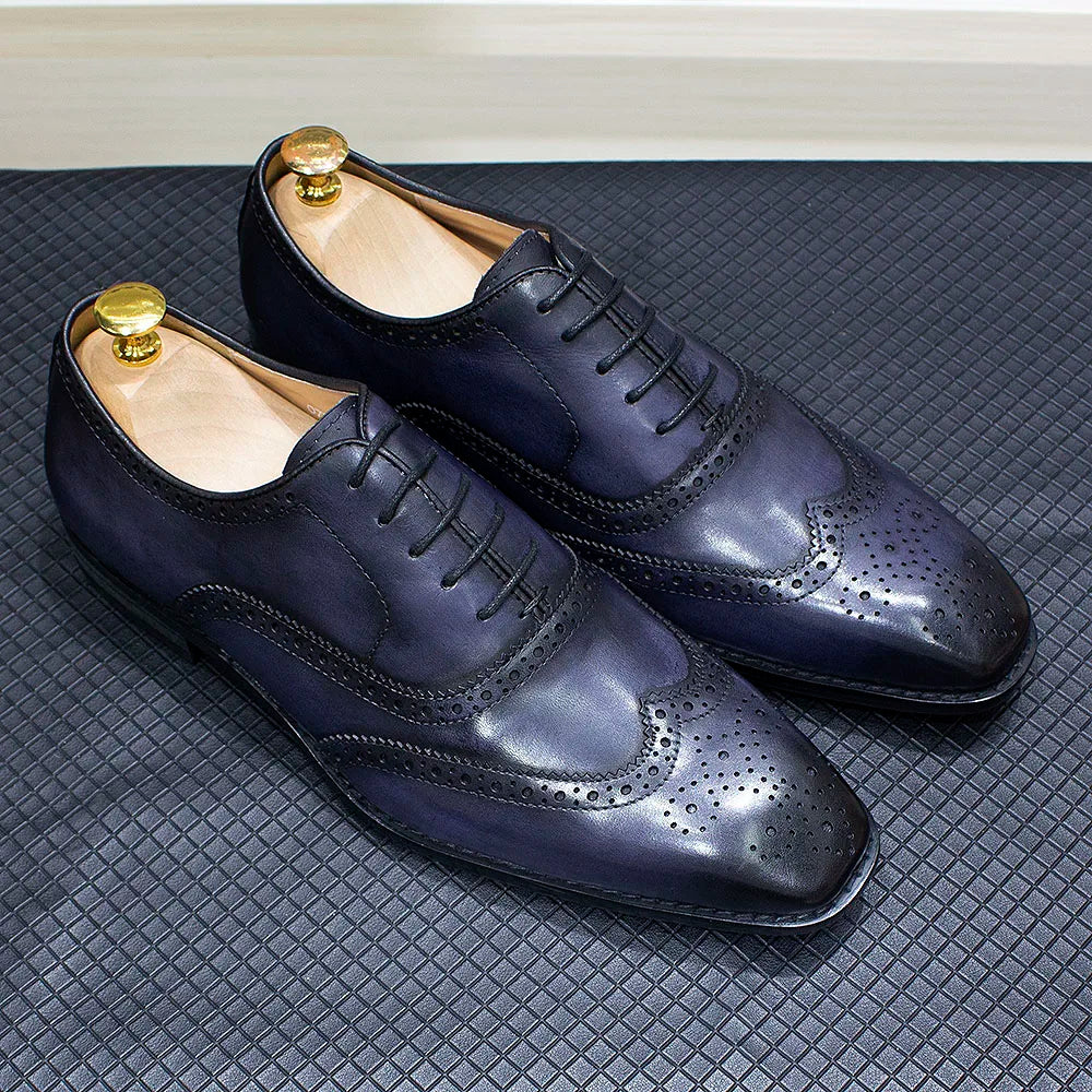Zapatos Oxford de hombre en cuero con detalles wingtip