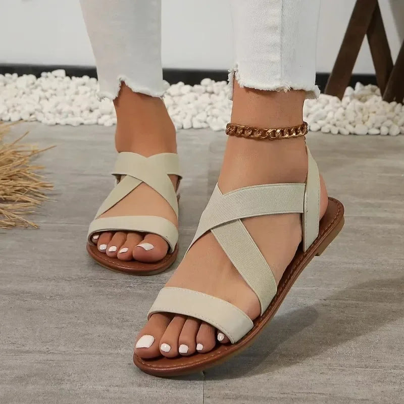 Sandalias planas de tejido con punta abierta