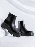 Botas de hombre con punta cuadrada y cierre lateral