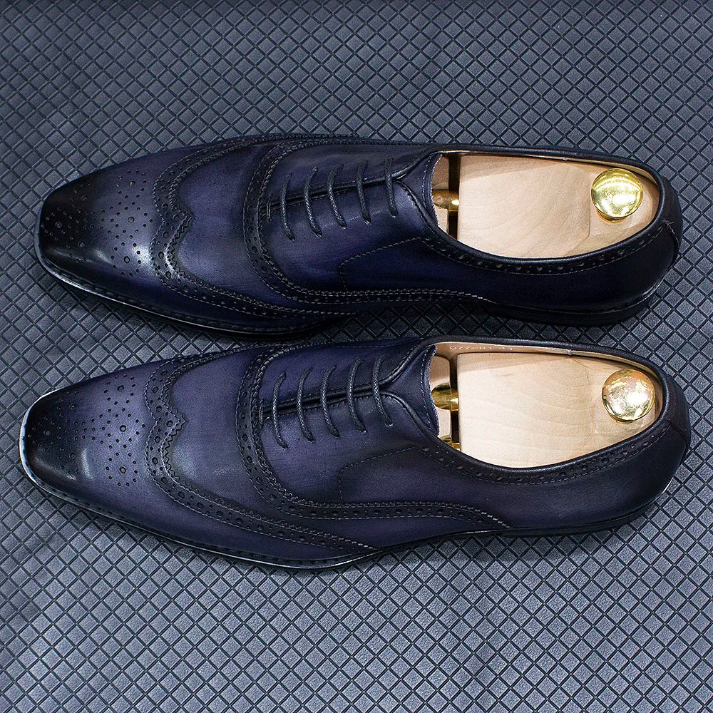 Zapatos Oxford de hombre en cuero con detalles wingtip