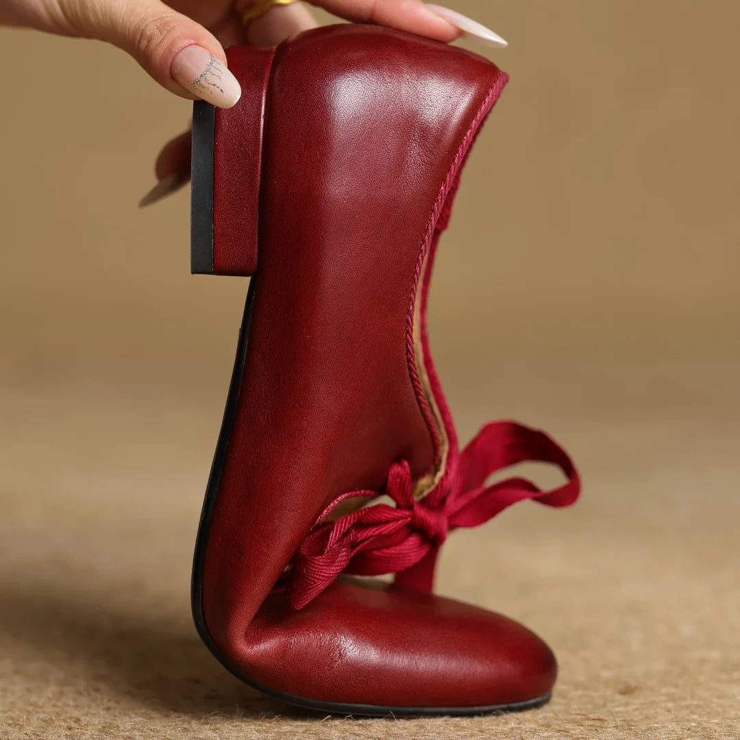 Zapatos de mujer en cuero con moño y punta redonda