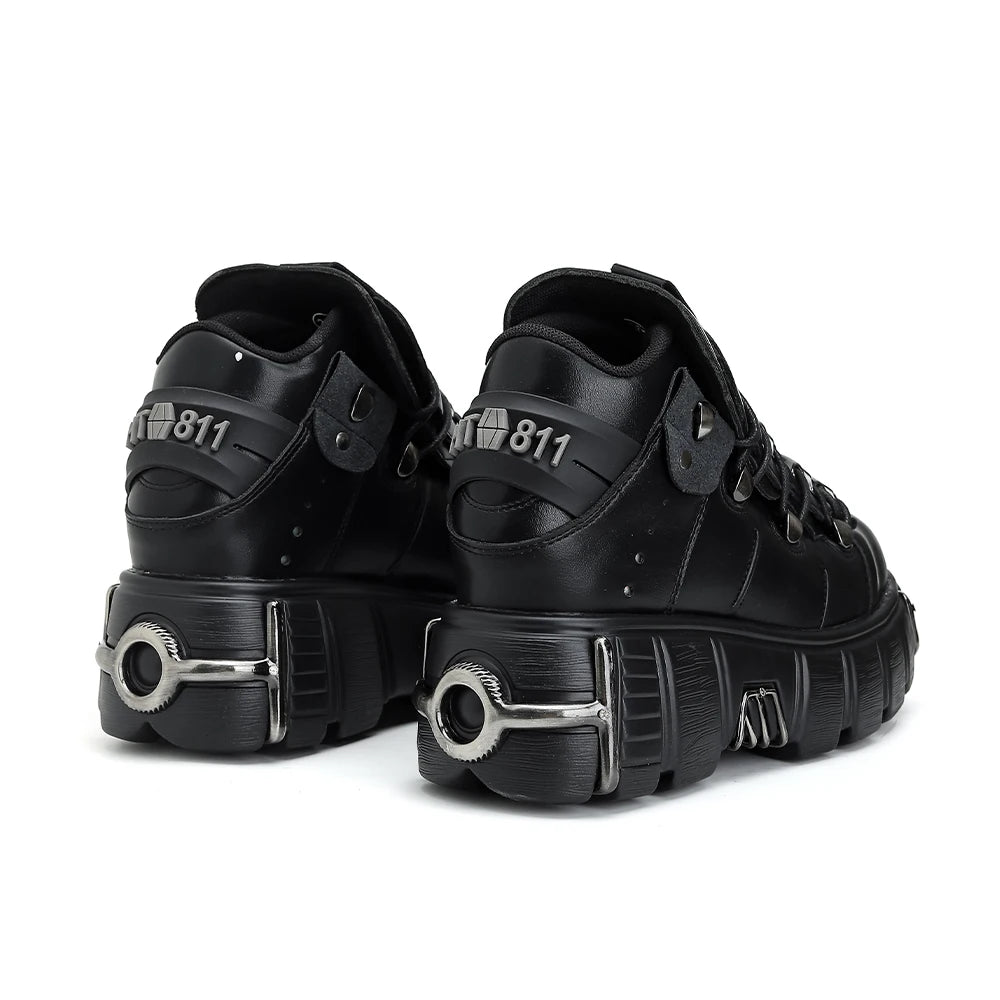 Borcegos de plataforma con cordones y detalles metálicos