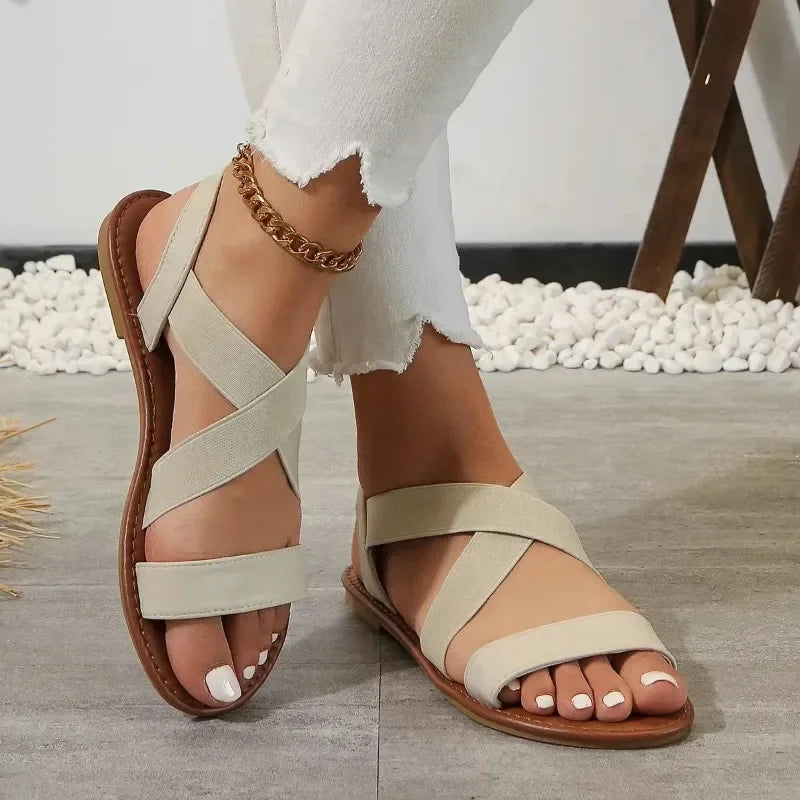Sandalias planas de tejido con punta abierta