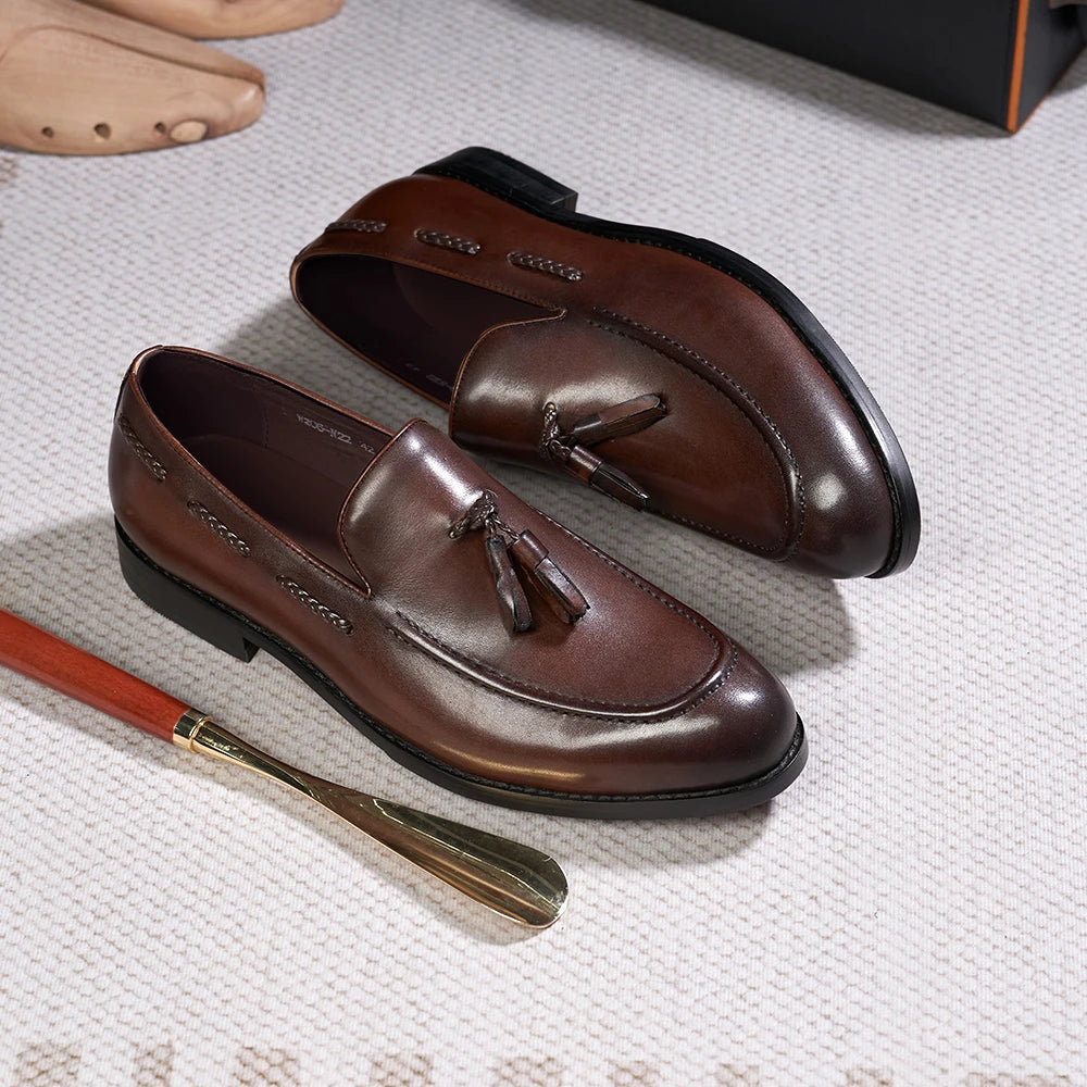 Mocasines de cuero con borlas y punta afinada