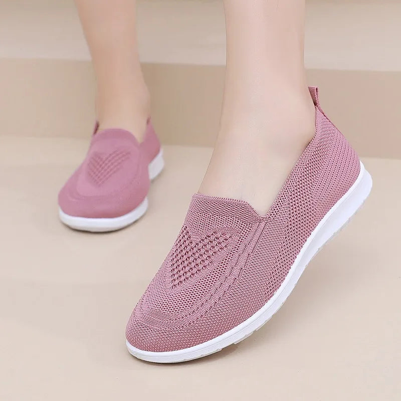 Zapatillas de mujer de malla con construcción cosida
