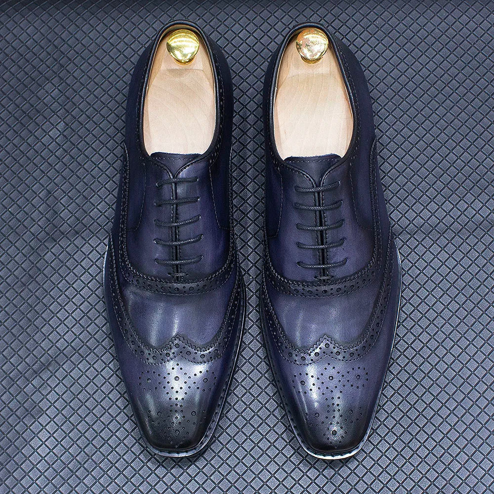 Zapatos Oxford de hombre en cuero con detalles wingtip