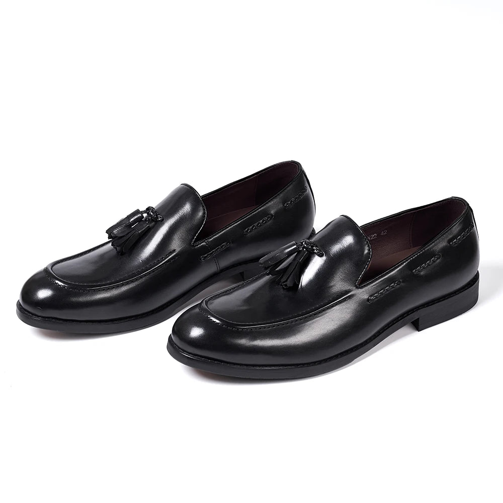 Mocasines de cuero con borlas y punta afinada