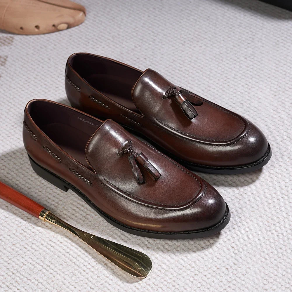 Mocasines de cuero con borlas y punta afinada